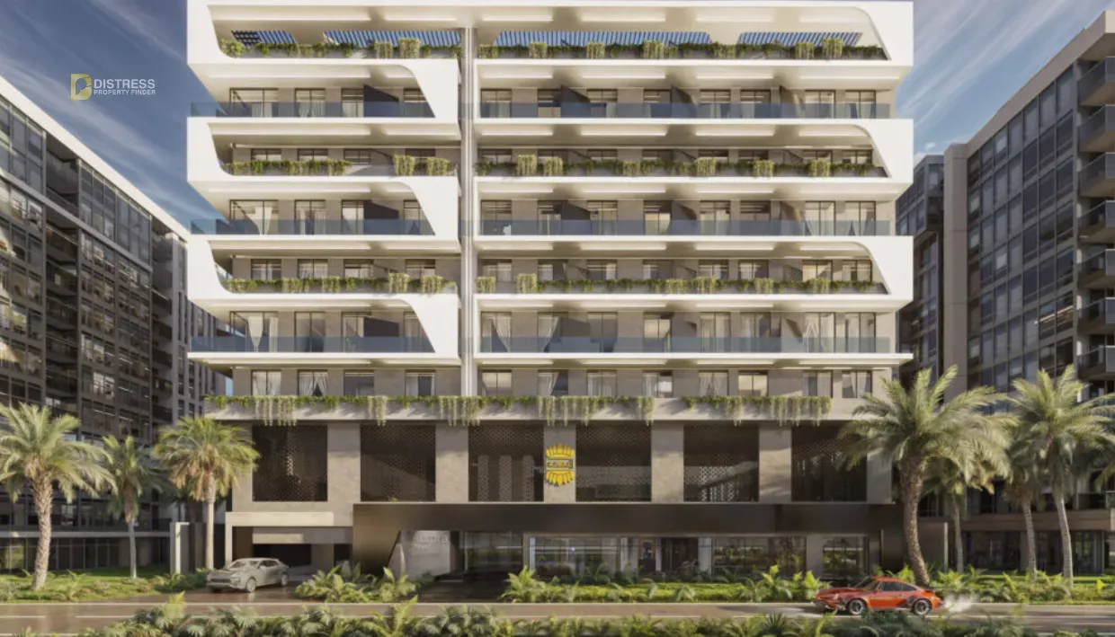 Night-lit mid-rise residential building with glass balconies at Stellar Axis near Al Warsan