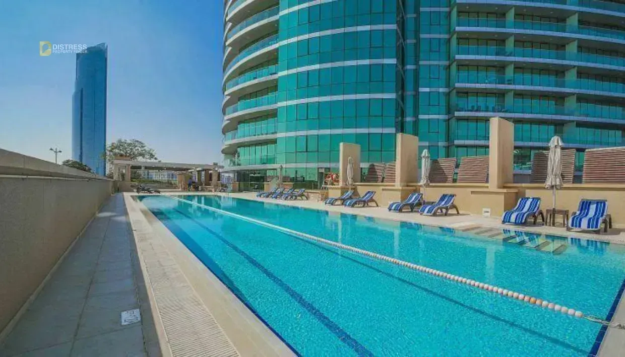 Waterfront plaza and mid-rise façades at Dubai Festival City near the Bukadra corridor