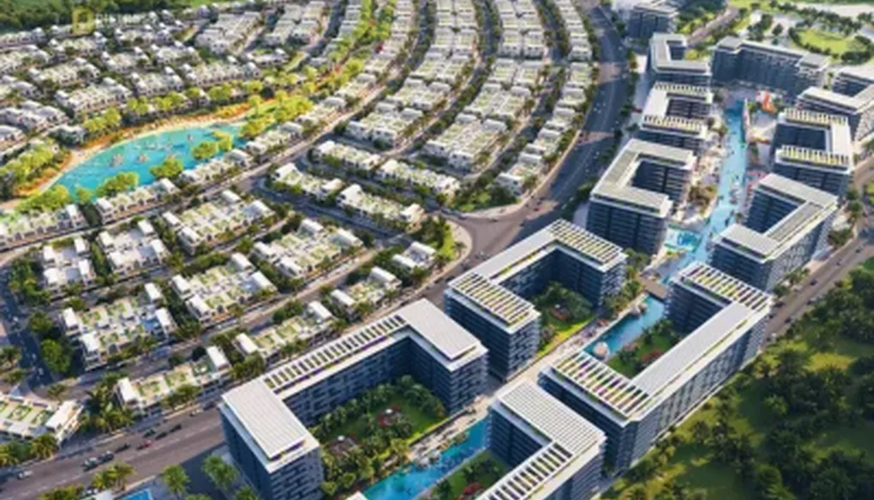 Aerial rendering of DAMAC Riverside townhouse rows and apartment blocks along a water channel