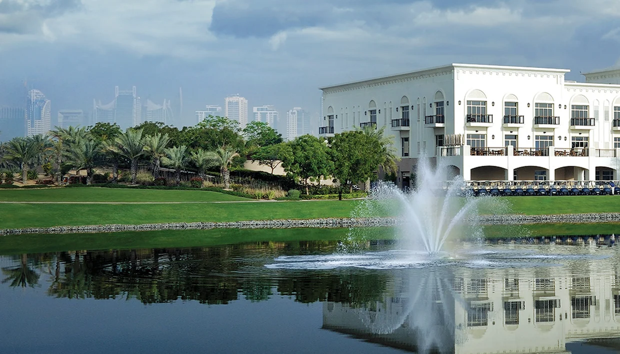 Landscaped parks and villa streets inside Emaar Emirates Living near The Meadows