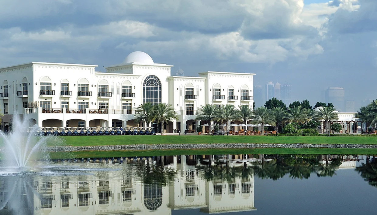 Lakeside landscaping and villa corridors inside Emaar Emirates Living
