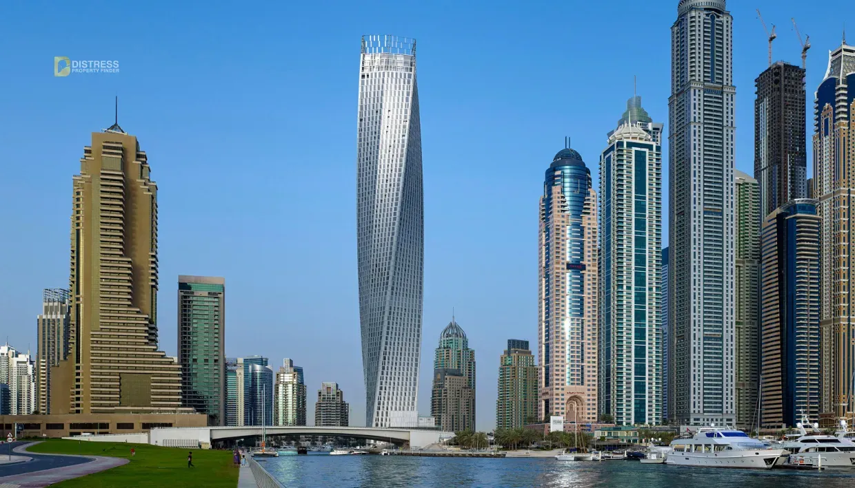 View of Cayan Tower among Dubai Marina towers, developed by Cayan Group