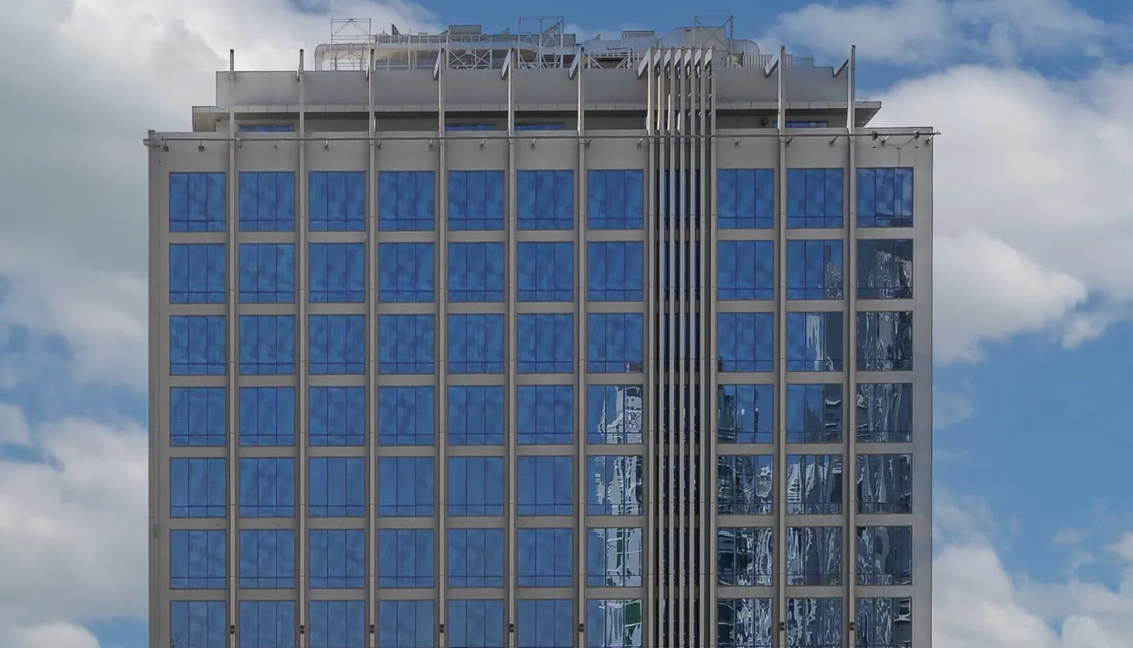 Exterior of the Avalon Tower building, home to Holiday Inn Dubai Village Circle in JVC, developed by The First Group